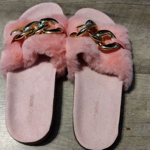 Faux fur slides.